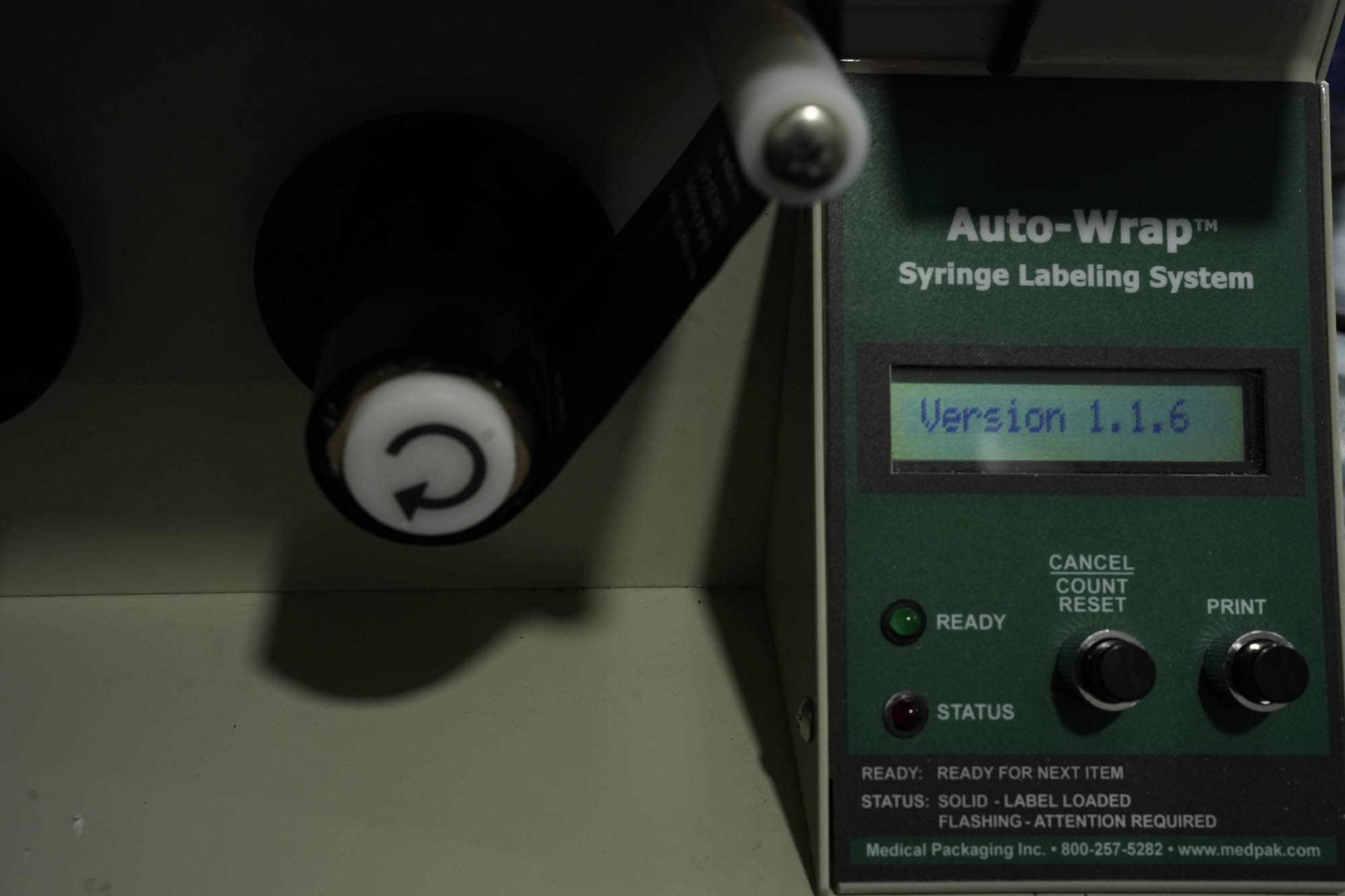 Auto-Wrap Medical Packaging Syringe Labeler SL-1 Auto-Wrap Medical Packaging Syringe Labeler SL-1