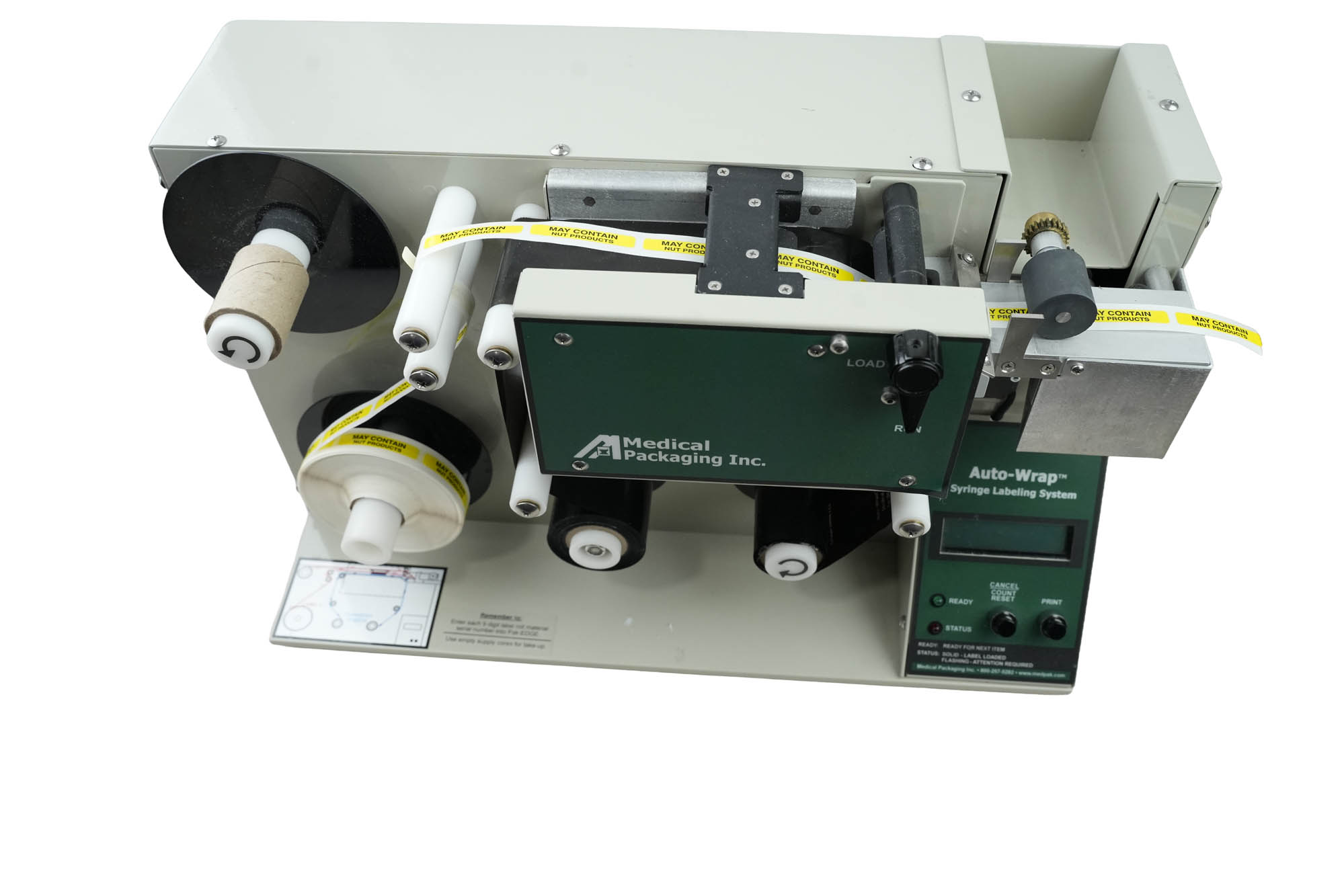 Auto-Wrap Medical Packaging Syringe Labeler SL-1 Auto-Wrap Medical Packaging Syringe Labeler SL-1
